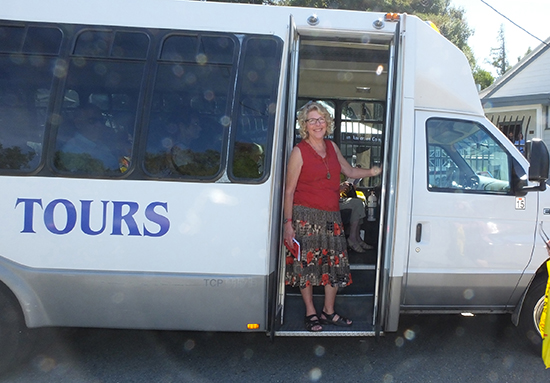 Bus transportation is provided on the Historic Home Tour in Martinez.  Noralea Gipner was a tour guide in 2016.